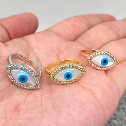 Anello regolabile con zirconia cubica intarsiata e conchiglia: Oro